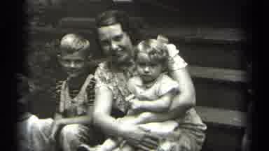 Cleveland Ohio (1938): Mother And Son And Daughter Gather To Take Black And White