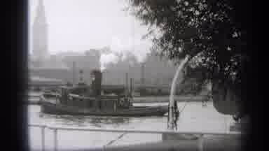 Cleveland Ohio (1938): View Of Grey Tugboat In Water On A Cloudy Day
