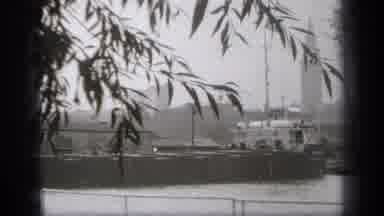 Cleveland Ohio (1938): Ship Moves And The Boat Floats The Opposite With Two Men