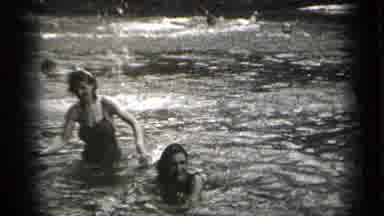Cleveland Ohio (1938): Women Frolicking And Splashing Each Other While Swimming In