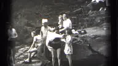Cleveland Ohio (1938): Woman Wearing Black Swimwear Tries Pulling Towel Away From