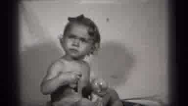 Cleveland Ohio (1938): A Little Child Enjoying The Bath