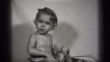 Cleveland Ohio (1938): A Baby Was Very Anxious To Take Bath And Give Bath To The