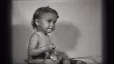 Cleveland Ohio (1938): A Baby Taking Bath And Giving Bath To Her Toy And Enjoying