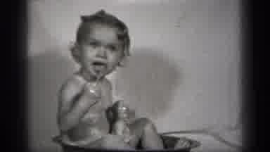 Cleveland Ohio (1938): A Baby Plays Inside A Tub And Water Was Very Cool To Take
