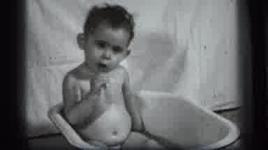 Cleveland Ohio (1939): Kid In A Bathtub Bathing And Looking Around