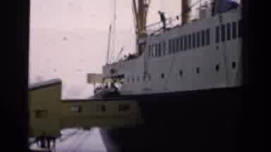 England (1949): A Huge Ship Stands And Loading The People And The Luggage Also To