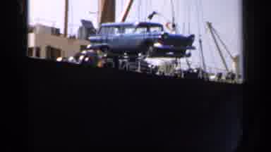 England (1949): A Heavy Vintage Car Being Carried On The Boat