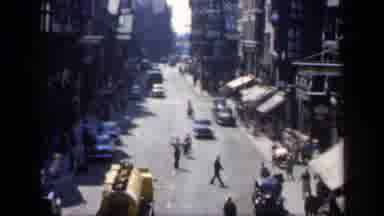 England (1949): A City Street With Minimal Cars And A Traffic Conductor With Many