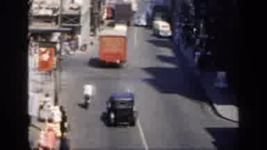 England (1949): Old Color Panning Shot Of A City Street That Cuts To An Old Castle