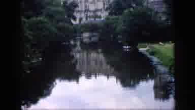 England (1949): A River And Huge Buildings Are Place To Move Around The Area