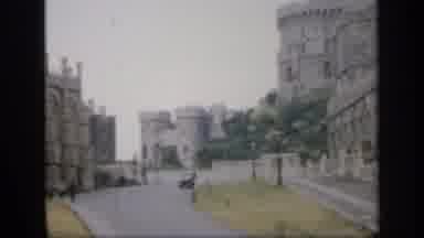England (1949): The Castle That Stands Tall By The Road That Is Dotted By Street