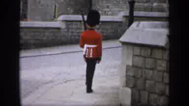 England (1949): A Man In Uniform Marches Towards The Garden