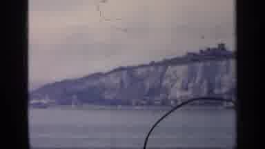 England (1949): A Cliff By A River Covered In Snow