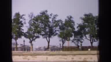 France (1949): Scenery Of A Town In The Distance At Ground Level With A Line Of