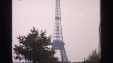 France (1949): Camera Pans Up The Tall Steel Tower That Dwarfs The Trees The Sit