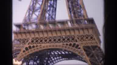 France (1949): Driving By The Eiffel Tower Panning From Base To Top On A Sunny Day
