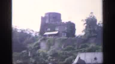 IRELAND-1949: Historic Castle On Lush Hill Overlooking Village