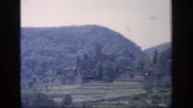 Ireland (1949): A Huge Mountain With Many Trees And Natural Looking Surroundings