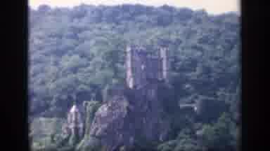 Ireland (1949): Castle On Rocky Outcrop Top Viewed From River With Tree-Covered