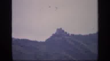 IRELAND-1949: Castle Ruin On Hilltop Against Overcast Sky