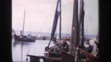 Ireland (1949): Boats Leave The Docks And Sail Out Onto The Clear Blue Water