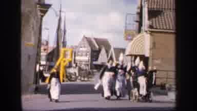 IRELAND-1949: Group of Women in Traditional Irish Attire Walking in Town