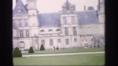 IRELAND-1949: Palace Garden with Flowers, Statues, and Visitors