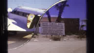 Cabo San Lucas Mexico (1974): Two People Stand Next White Airplane On A Bright