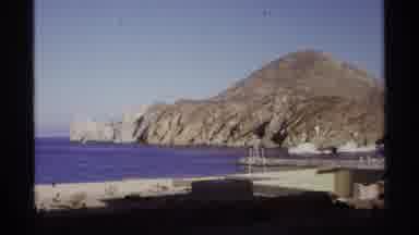Cabo San Lucas Mexico (1974): View Of Tan Island And Blue Ocean Water On A Sunny