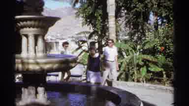 Cabo San Lucas Mexico (1974): Three People Walk Around Outdoor Fountain On A