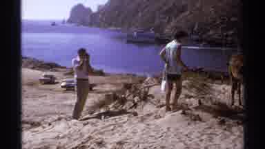 Cabo San Lucas Mexico (1974): Person Petting Deer As Someone Takes A Photo
