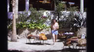 Cabo San Lucas Mexico (1974): An Older Man Walking Near A Pool