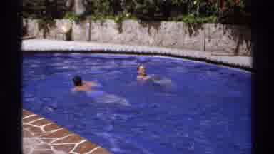 Cabo San Lucas Mexico (1974): Two Men Swim In Pool While Two Women Leave Brown And