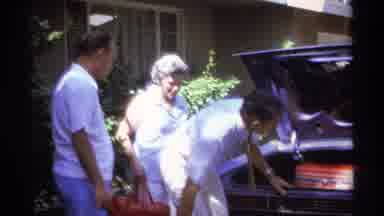 La Paz Mexico (1974): Trunk People Family Car Packing Shrubs House Driveway