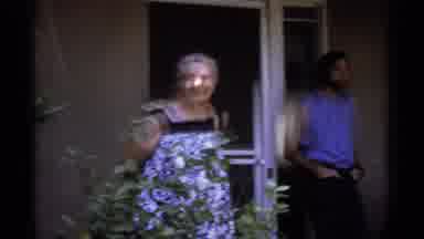 La Paz Mexico (1974): Elderly Woman Hands Folded Behind Her Back Smiling Talking
