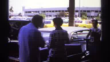 La Paz Mexico (1974): Family Exiting Airport In Old Car Film Is Vintage Showing