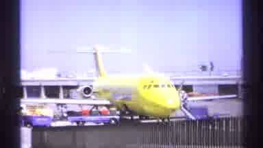 La Paz Mexico (1974): A Yellow Plane Parked As It Loads Baggage And People Wait To