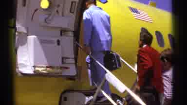 La Paz Mexico (1974): Passengers Boarding Yellow Airplane Via Outdoor Stairs Scene