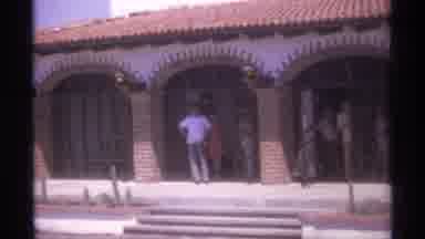 La Paz Mexico (1974): Several People At The Door In Front Of A Building
