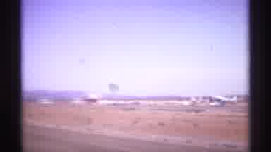 La Paz Mexico (1974): Airplane And Other Equipment In A Desert Then A Couple Poses