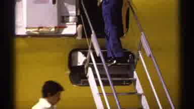 La Paz Mexico (1974): Group Of People Boarding A Private Yellow Plane And Grabbing