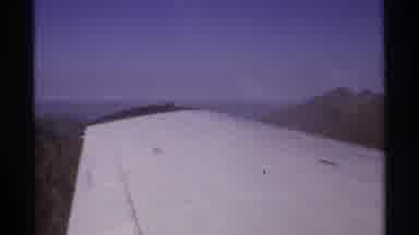 La Paz Mexico (1974): Person Filming From Plane With Mountains On The Bottom