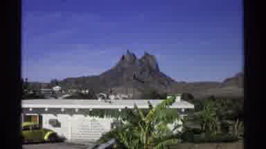Guaymas Mexico (1975): Distant Mountain And Person Walking Away Along Rocky Road