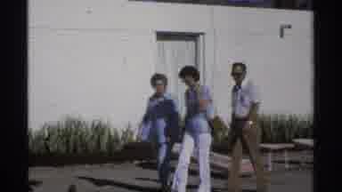 Guaymas Mexico (1975): Two Women And A Man Walking Towards Someone In A Parking