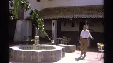 Guaymas Mexico (1975): Couple Walks To Poolside Table On A Bright Sunny Day