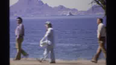 Guaymas Mexico (1975): Two Men And A Woman Walk Along The Beach Next To The Ocean