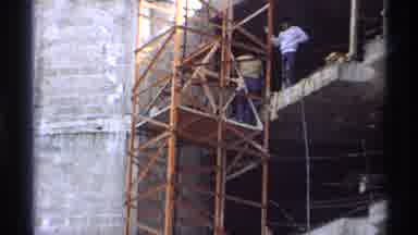 Guaymas Mexico (1975): A Huge Building With The Rocks And High Lift Shows The