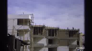 Guaymas Mexico (1975): View Of Tan Building And Palm Tree On A Clear Day
