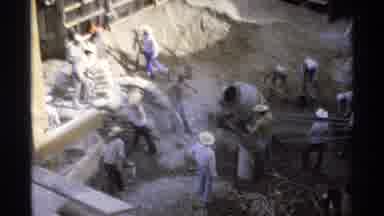Guaymas Mexico (1975): Men Wearing White Hats Dig At Construction Site On A Clear